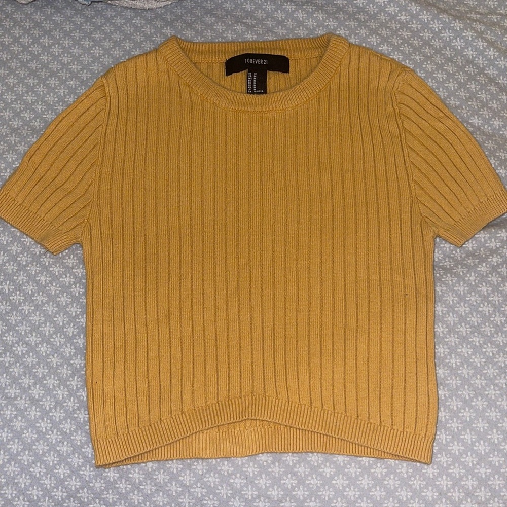 Brand is forever 21. US size medium, fits more like a size small.